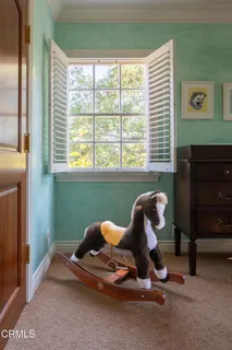 a view of a golf course with a lake