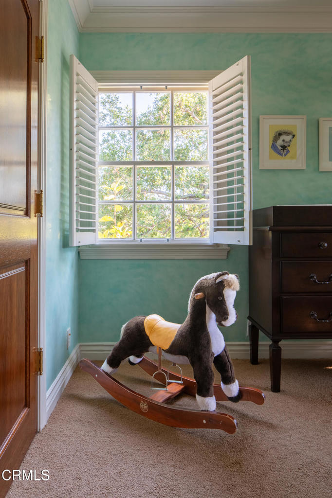 3121 Monterey Road San Marino, CA 91108 - Photo 48 of 77 a room with furniture and a window