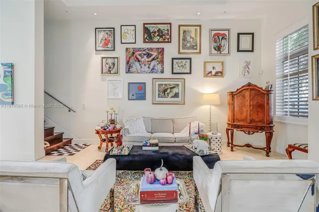 a living room with furniture and a couch