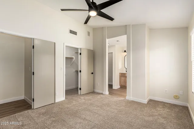 a bathroom with 2 sink and a mirror