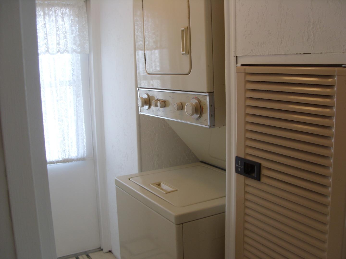 1117 Baldwin Street, Unit 74 Salinas, CA 93906 - Photo 12 of 13 a utility room with dryer and washer