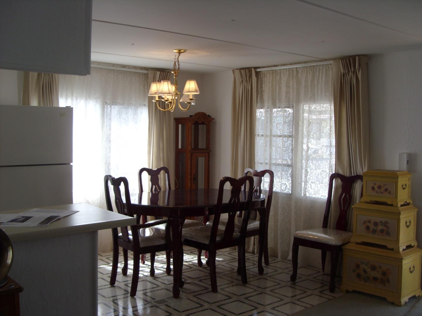 1117 Baldwin Street, Unit 74 Salinas, CA 93906 - Photo 7 of 13 a view of a dining room with furniture window and outside view
