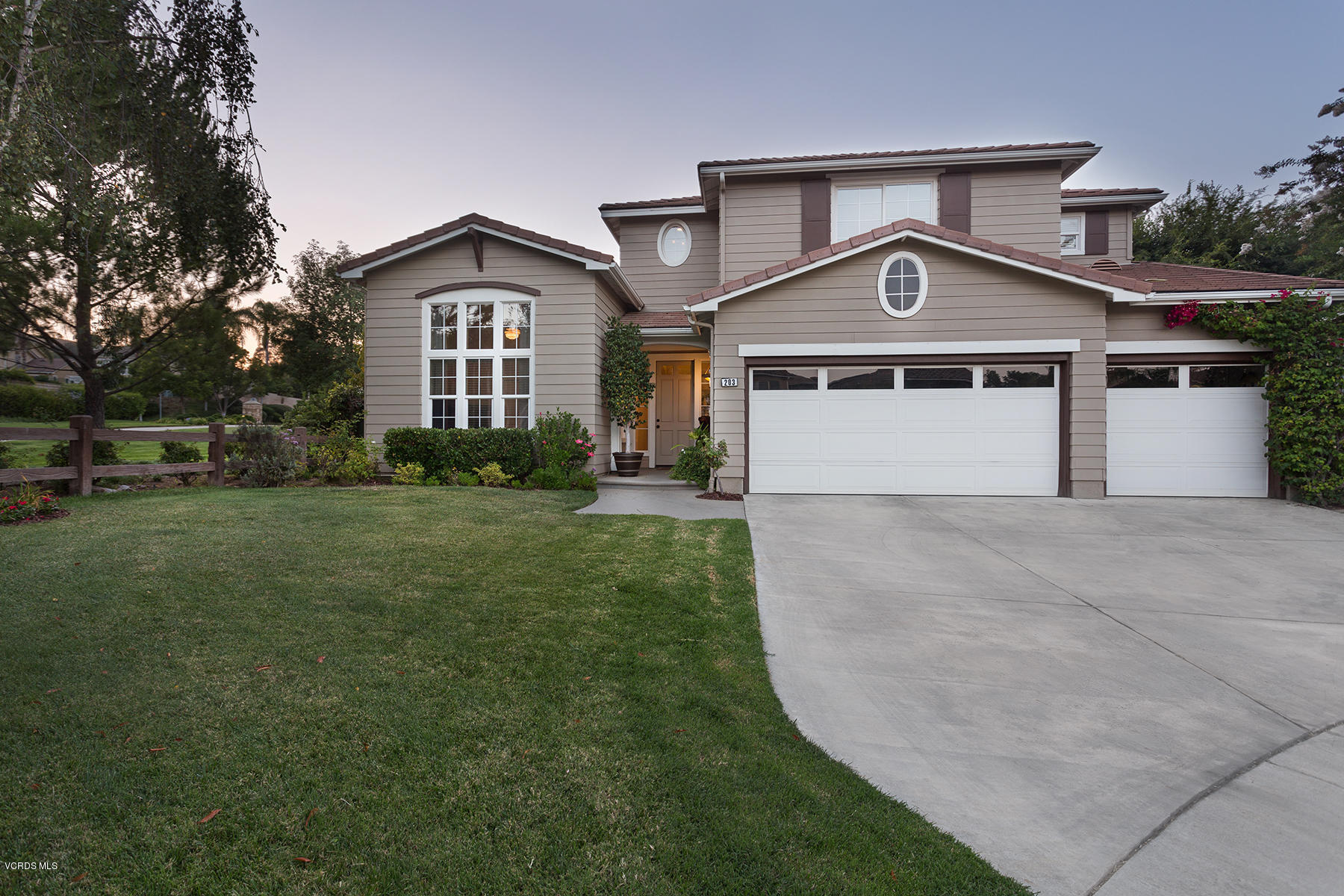 203 Knoll Ridge Road Simi Valley, CA 93065 - Photo 2 of 53 a front view of a house with a yard