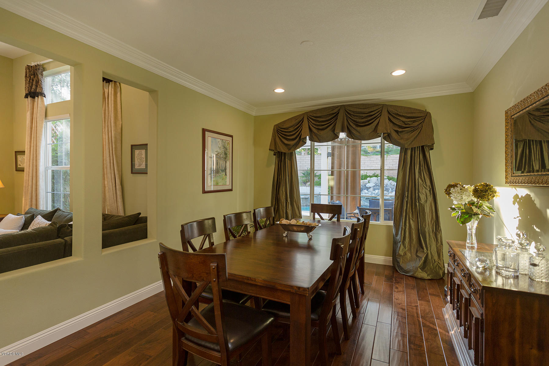 203 Knoll Ridge Road Simi Valley, CA 93065 - Photo 12 of 53 a view of a dining room with furniture and wooden floor