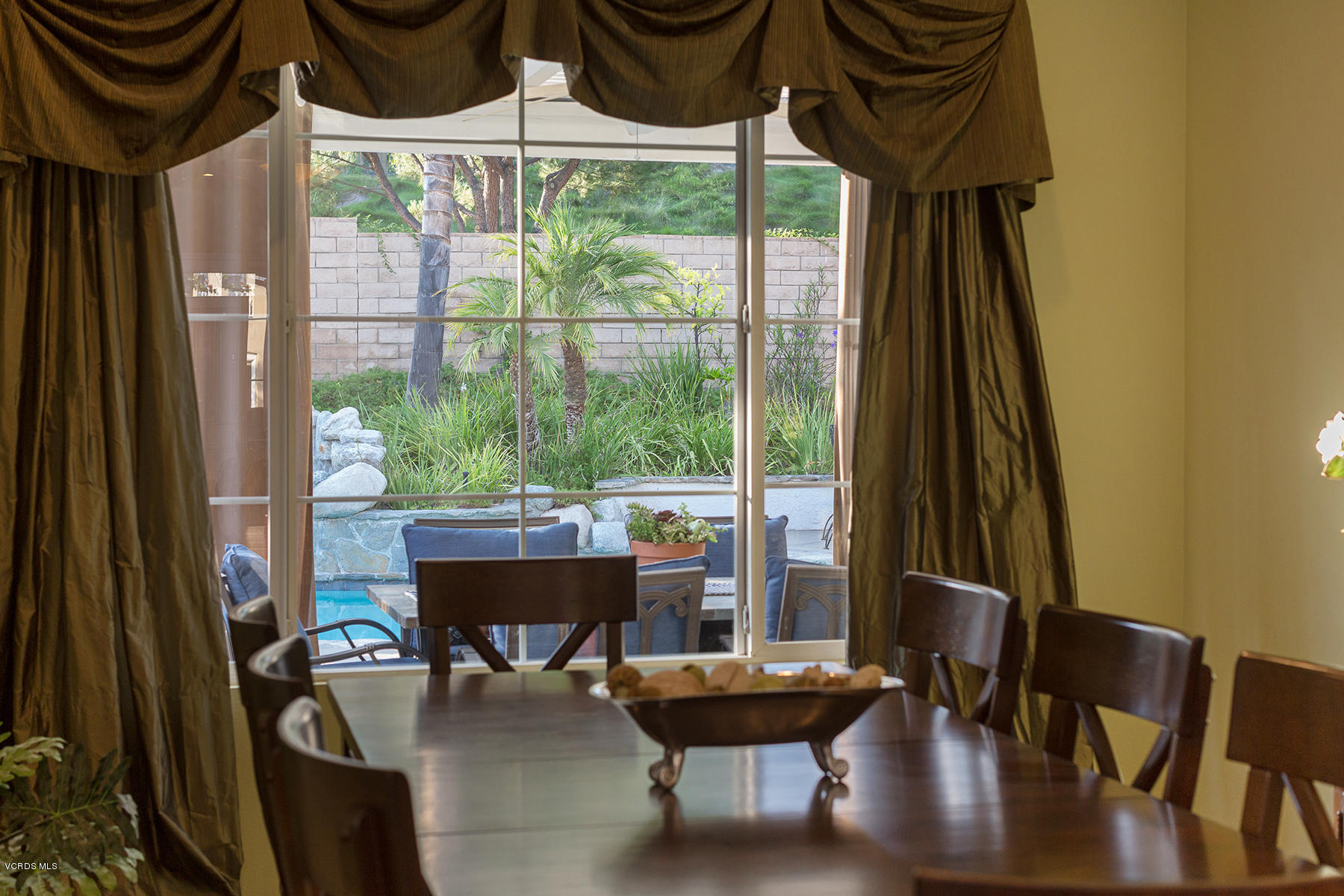 203 Knoll Ridge Road Simi Valley, CA 93065 - Photo 13 of 53 a view of a dining room with furniture window and outside view