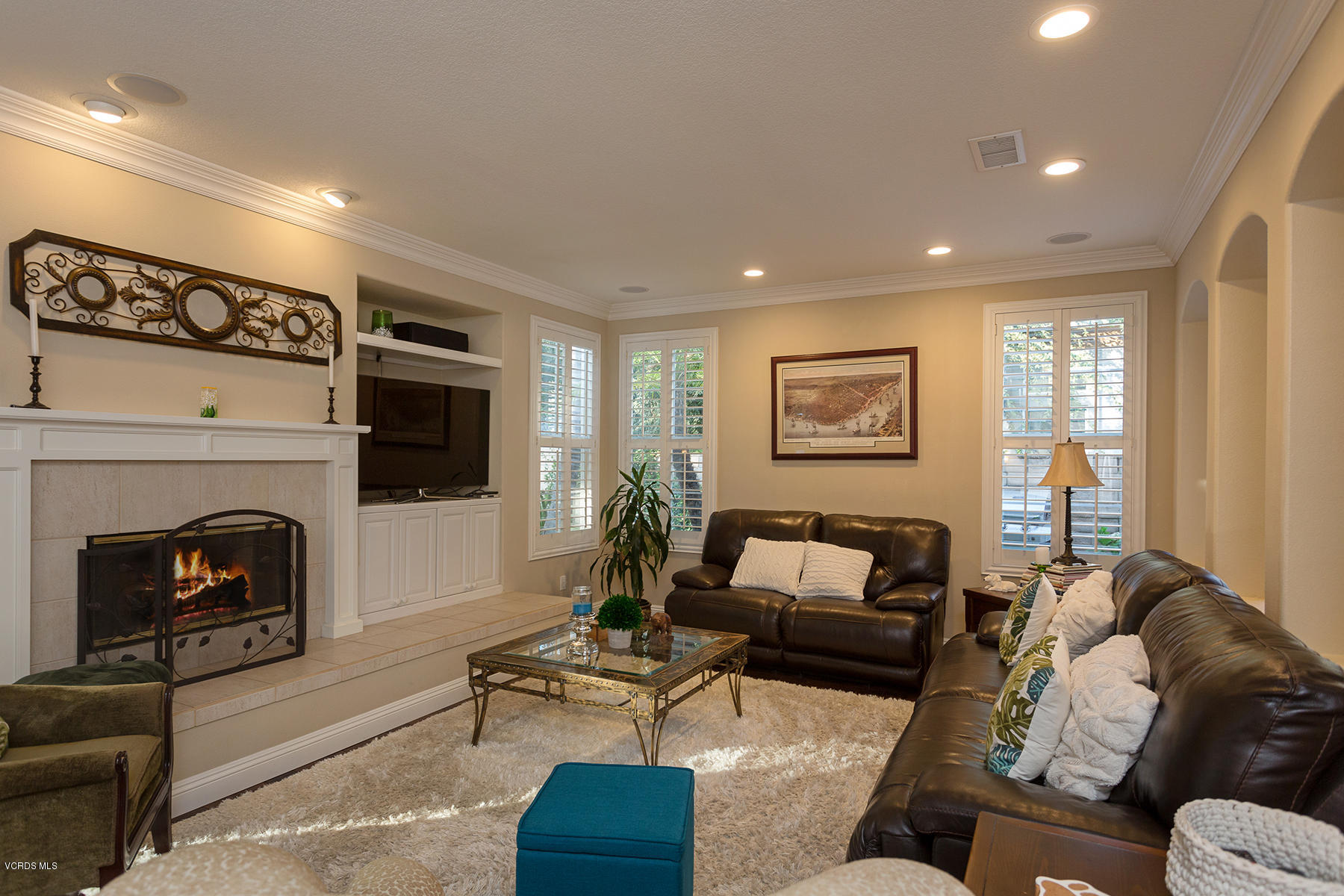 203 Knoll Ridge Road Simi Valley, CA 93065 - Photo 21 of 53 a living room with furniture and a fireplace