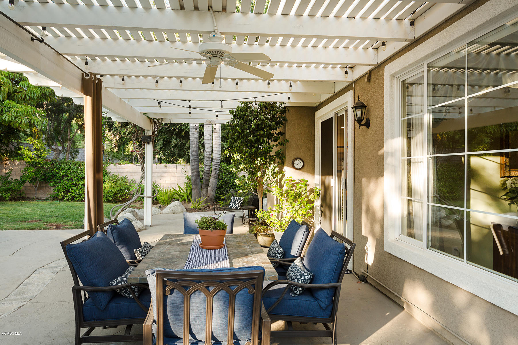 203 Knoll Ridge Road Simi Valley, CA 93065 - Photo 24 of 53 a view of an outdoor dining space with a table and chairs