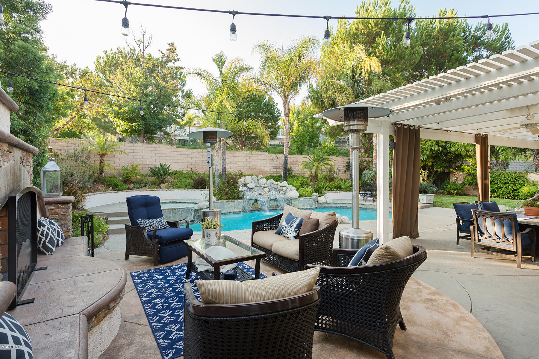 203 Knoll Ridge Road Simi Valley, CA 93065 - Photo 32 of 53 a patio with patio a couch and chairs