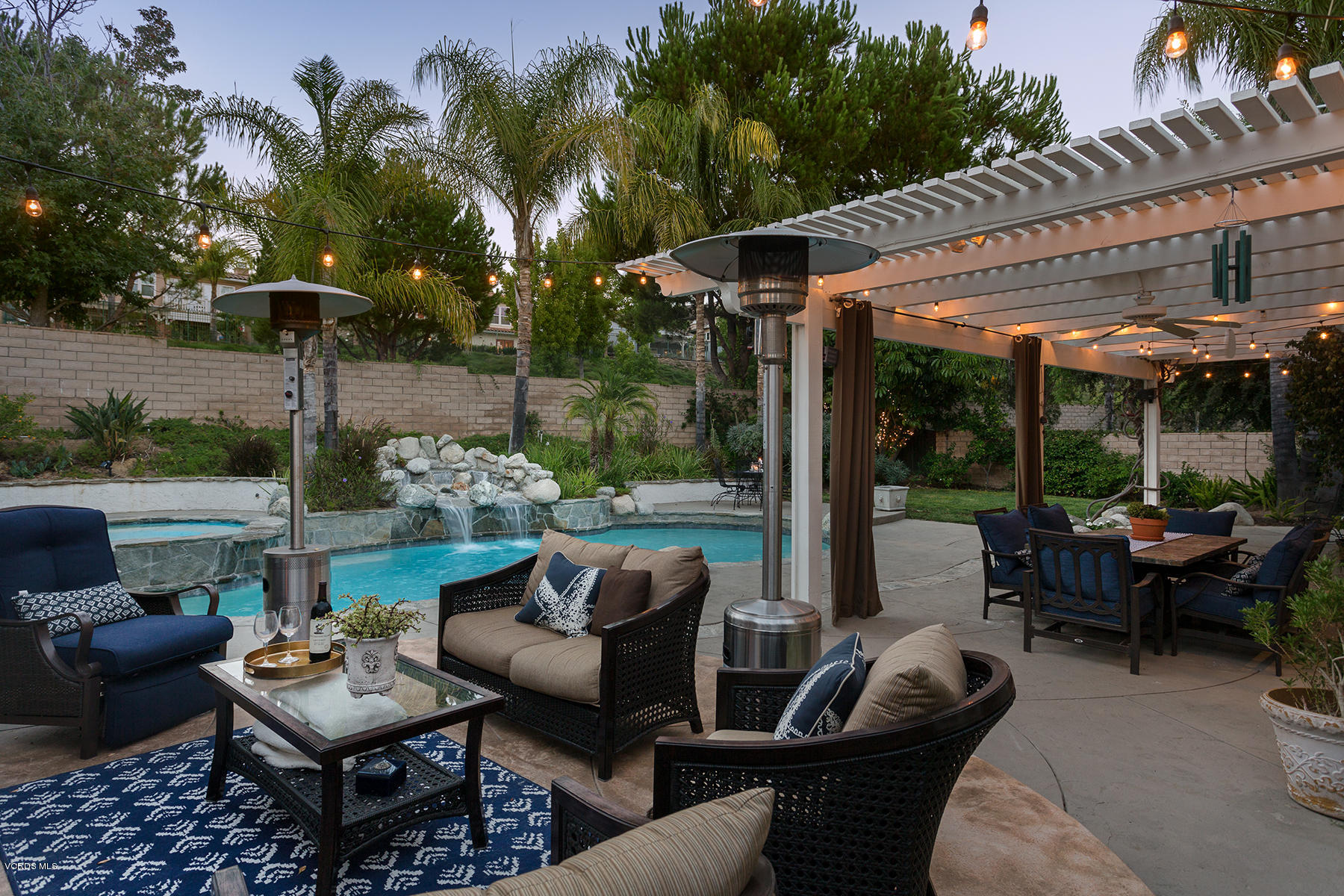 203 Knoll Ridge Road Simi Valley, CA 93065 - Photo 33 of 53 a view of a patio with couches chairs and a potted plant