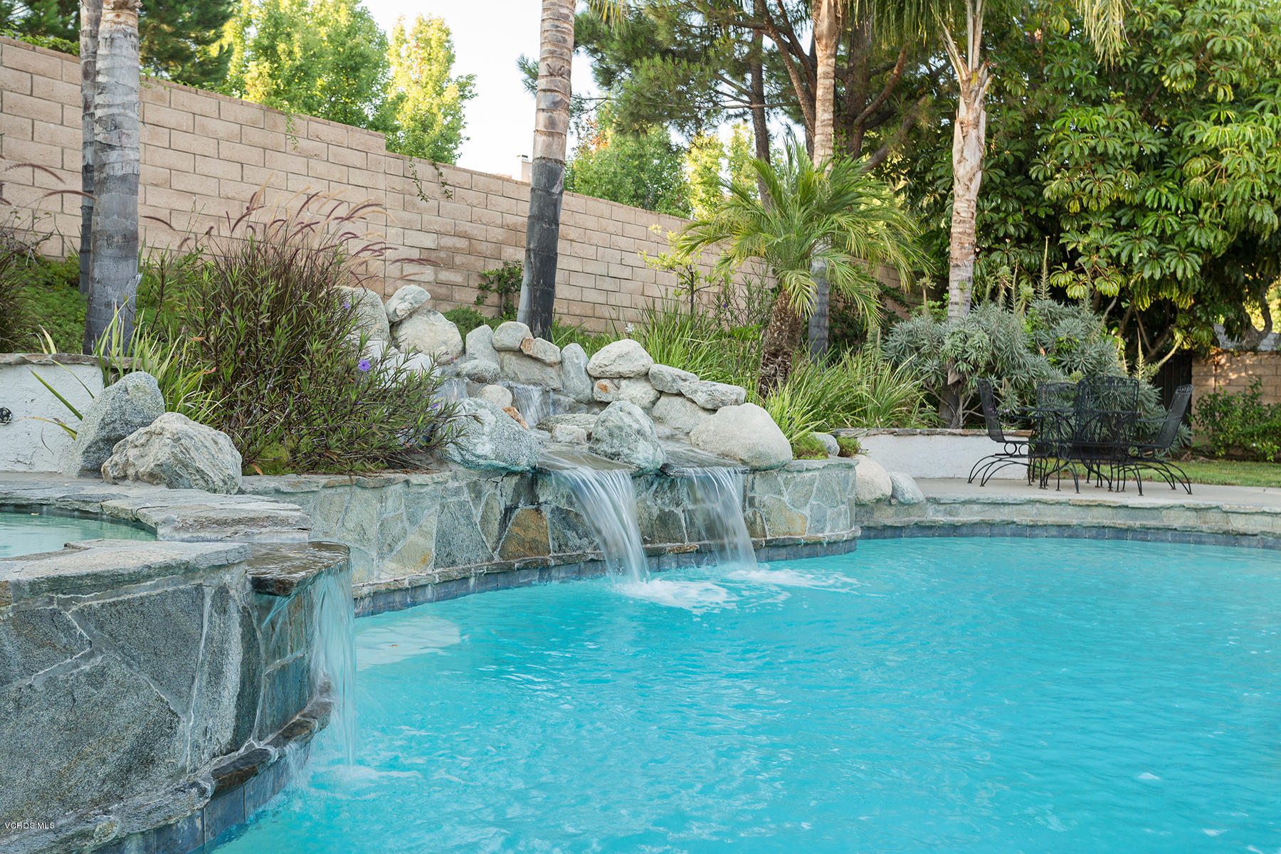 203 Knoll Ridge Road Simi Valley, CA 93065 - Photo 38 of 53 a view of a house with a yard porch and sitting area