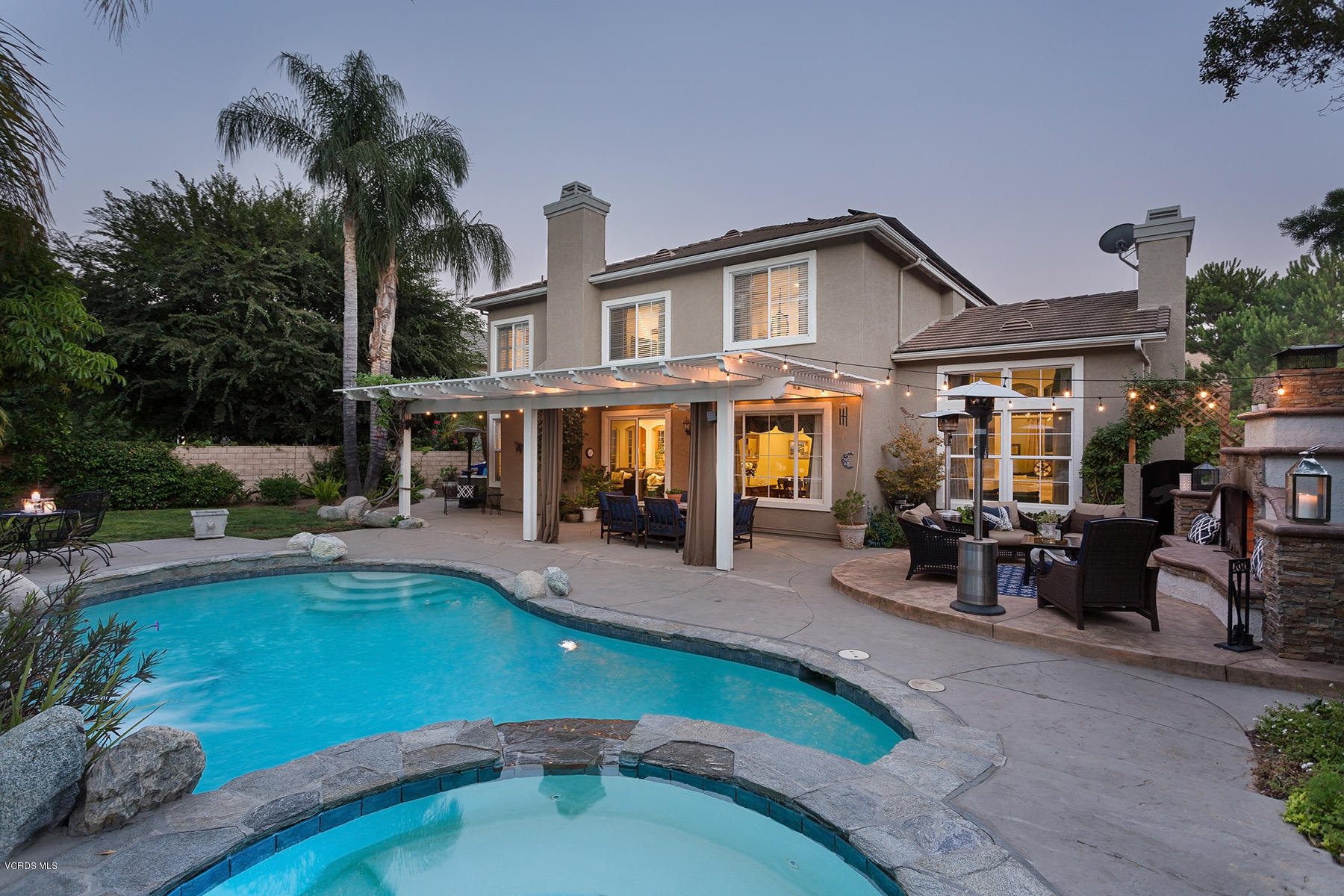 203 Knoll Ridge Road Simi Valley, CA 93065 - Photo 41 of 53 a view of a house with swimming pool and sitting area