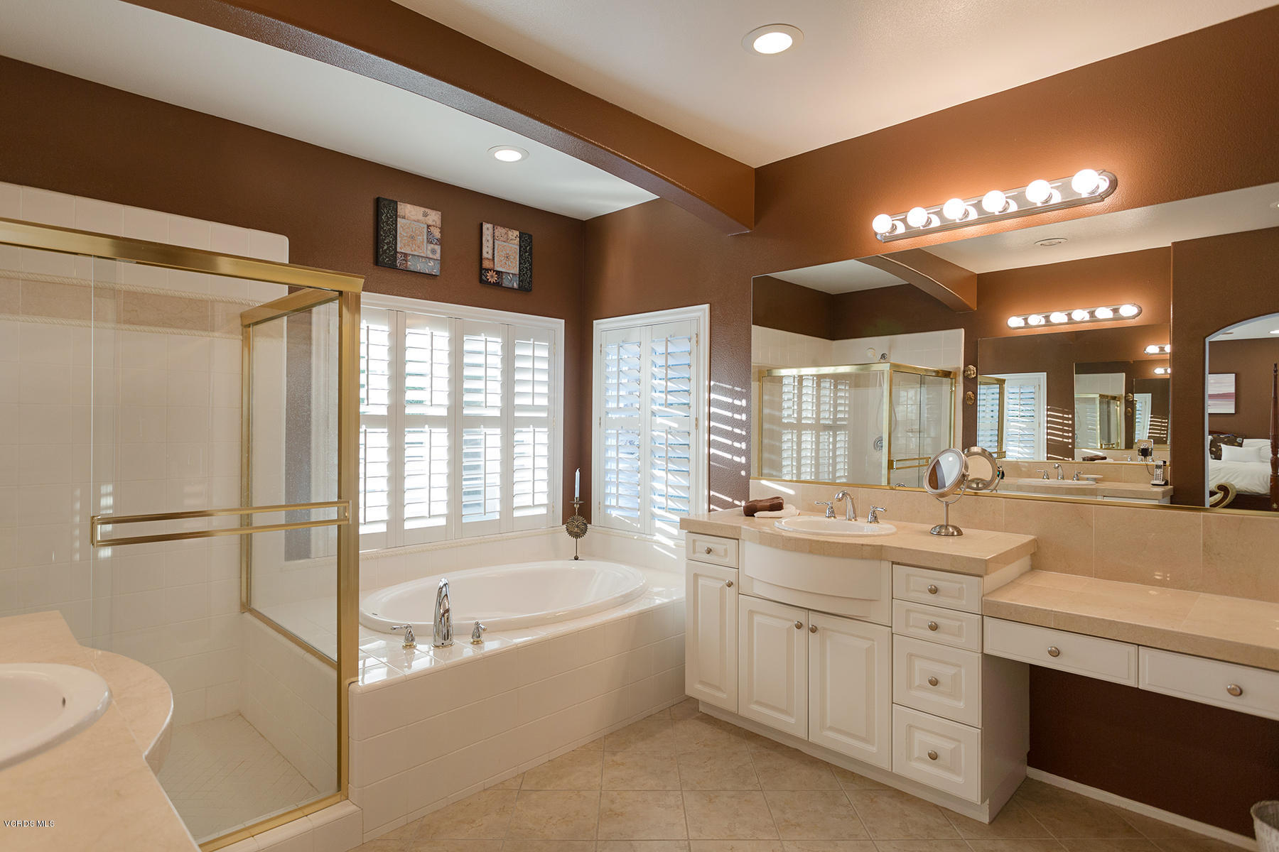 203 Knoll Ridge Road Simi Valley, CA 93065 - Photo 43 of 53 a bathroom with a granite countertop sink mirror bathtub and toilet