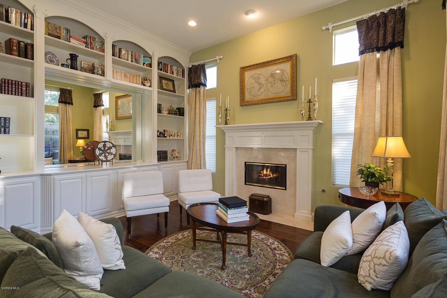 203 Knoll Ridge Road Simi Valley, CA 93065 - Photo 10 of 53 a living room with furniture fireplace and a large window