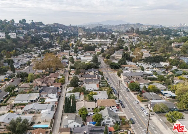 an aerial view of a city with lots of residential buildings