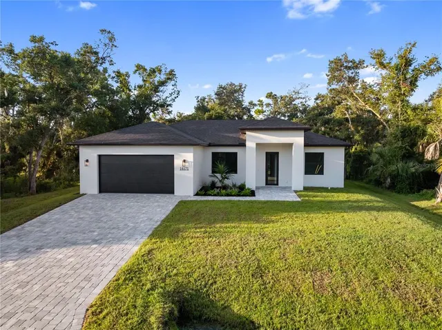 a kitchen with a sink and a window