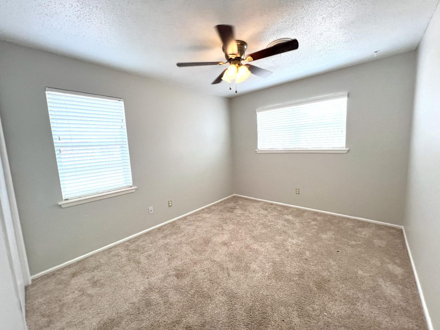5540 18th Street Lubbock, TX 79416 - Photo 14 of 18 a view of a big room with windows