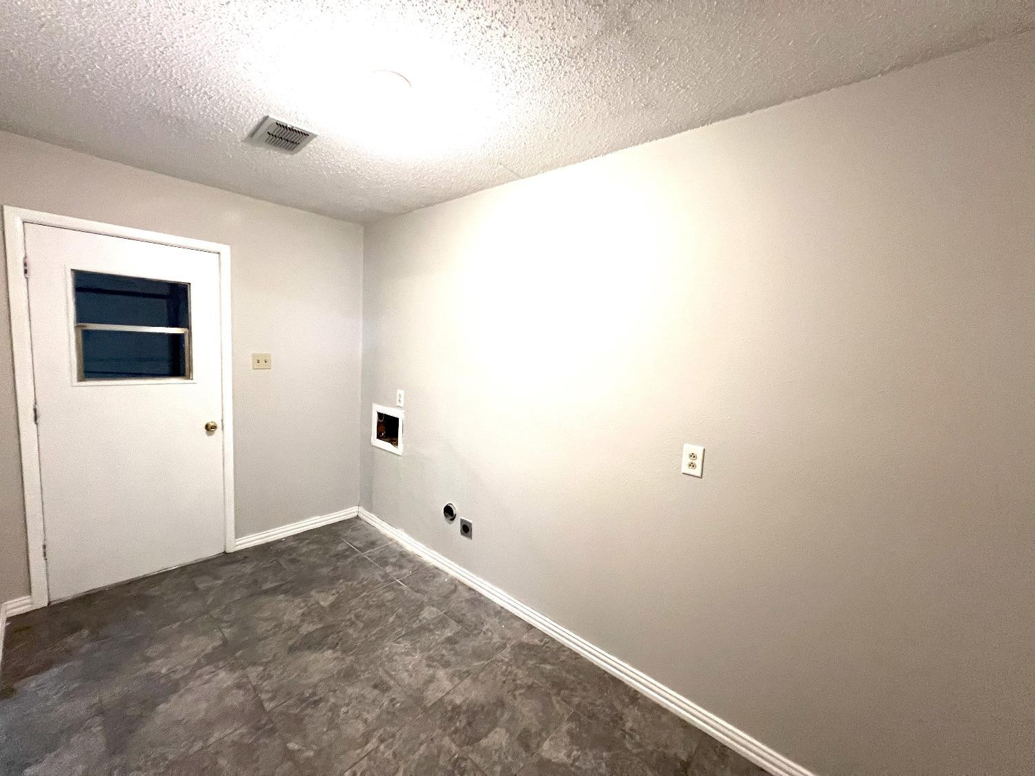 5540 18th Street Lubbock, TX 79416 - Photo 5 of 18 a view of an empty room