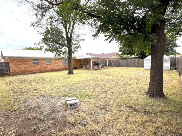 a view of a swimming pool with an ocean view