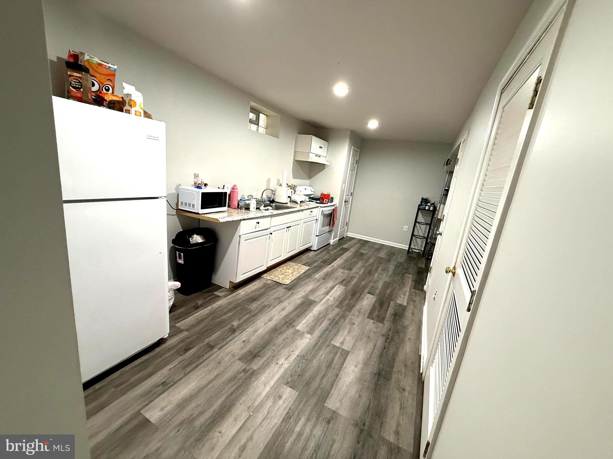 7713 Rotherham Drive Hanover, MD 21076 - Photo 22 of 27 Basement Kitchen