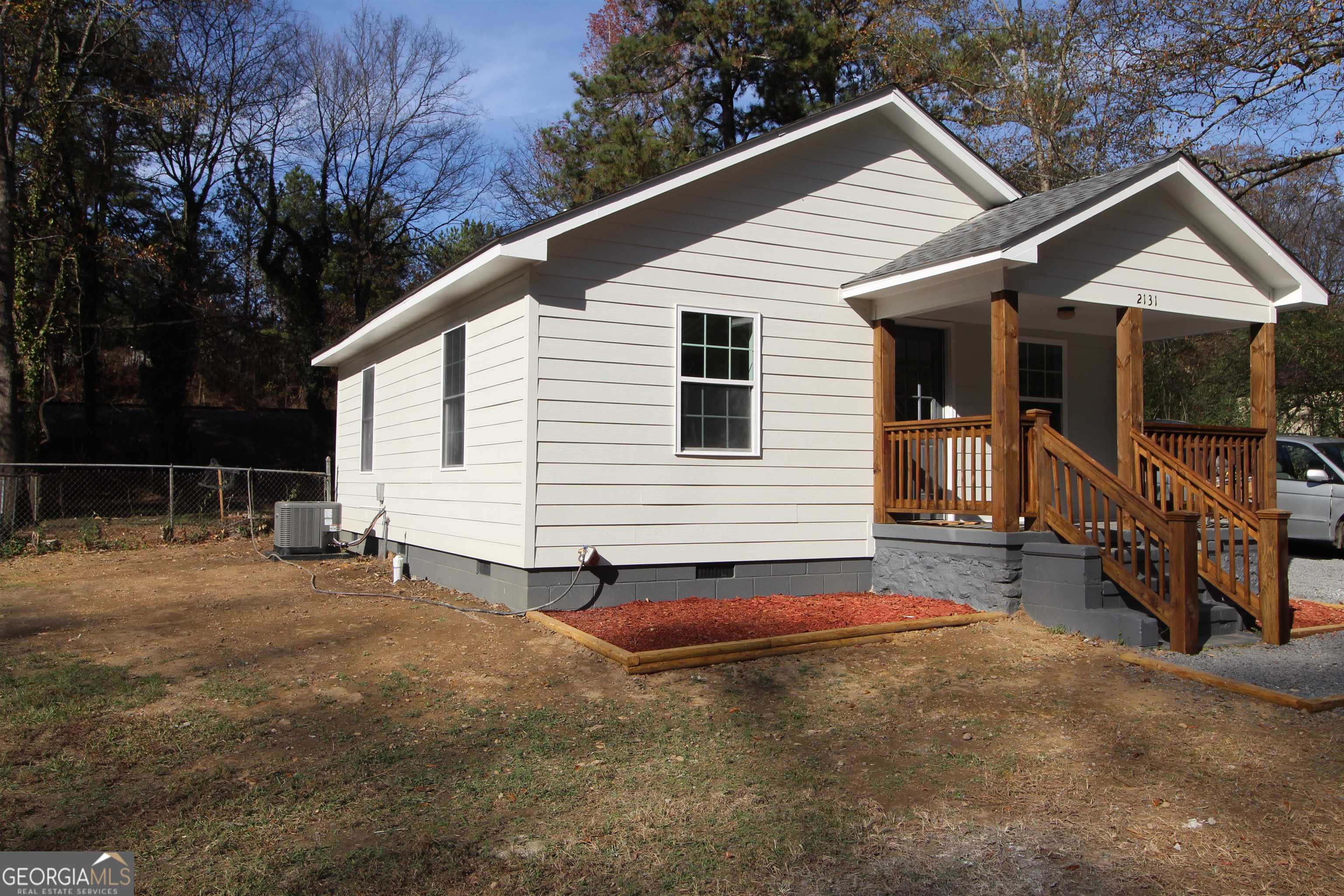 2131 Southern Street Northeast Rome, GA 30161 - Photo 1 of 1 a view of backyard with deck and seating area