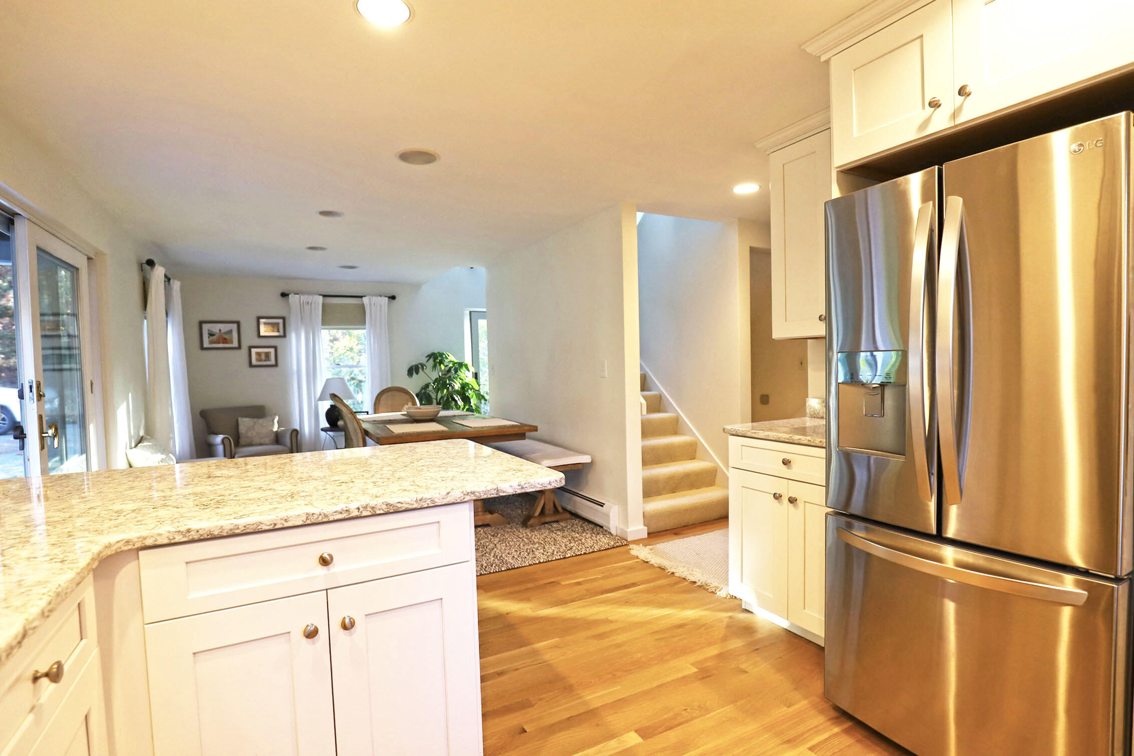 50 Jackson Drive Cotuit, MA 02635 - Photo 13 of 30 a kitchen with stainless steel appliances granite countertop a refrigerator and a sink