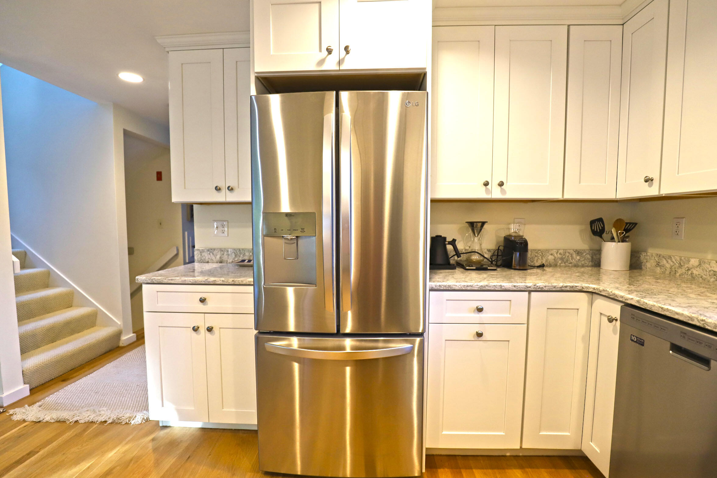 50 Jackson Drive Cotuit, MA 02635 - Photo 15 of 30 a kitchen with a refrigerator sink and cabinets