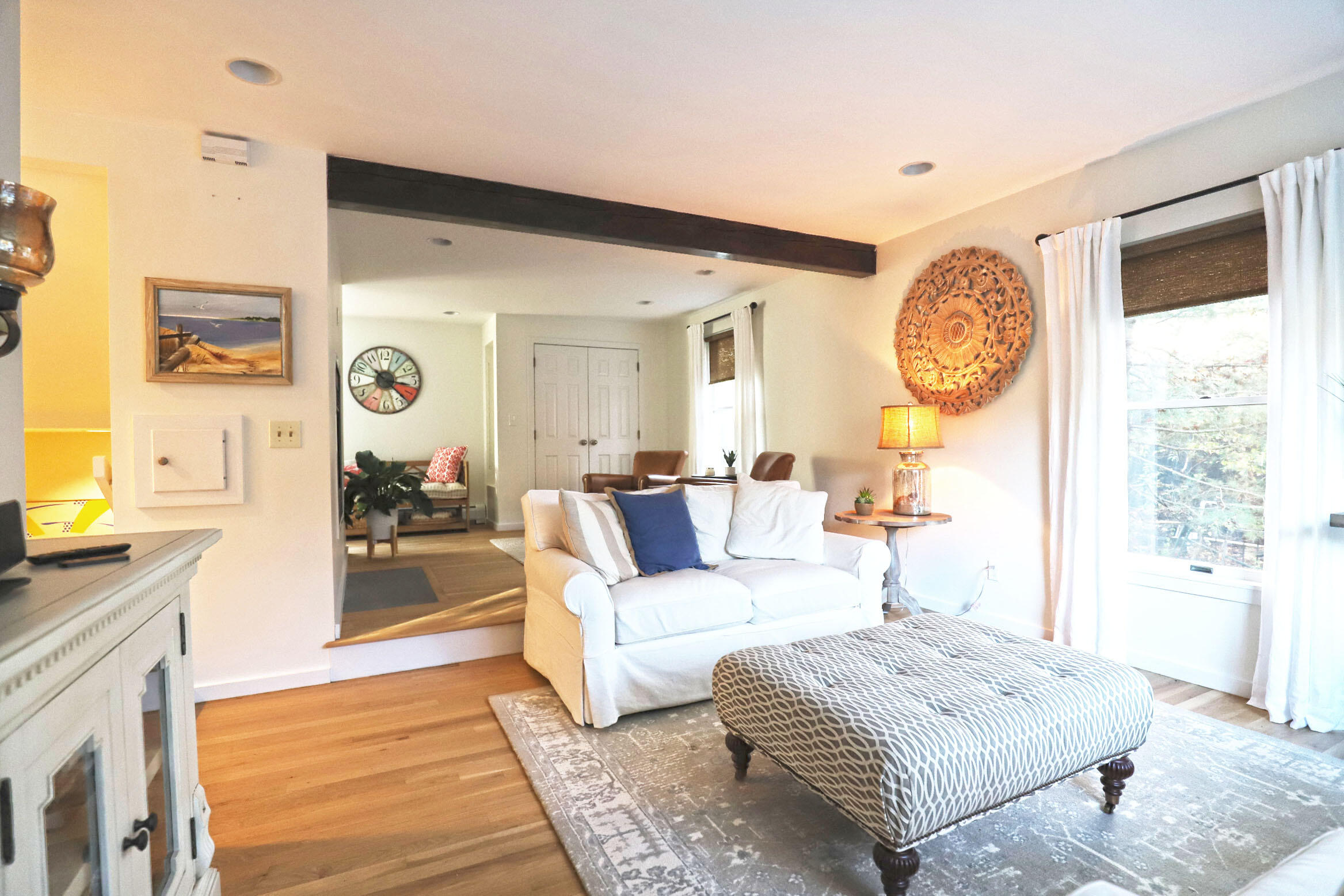 50 Jackson Drive Cotuit, MA 02635 - Photo 17 of 30 a living room with furniture and a large window