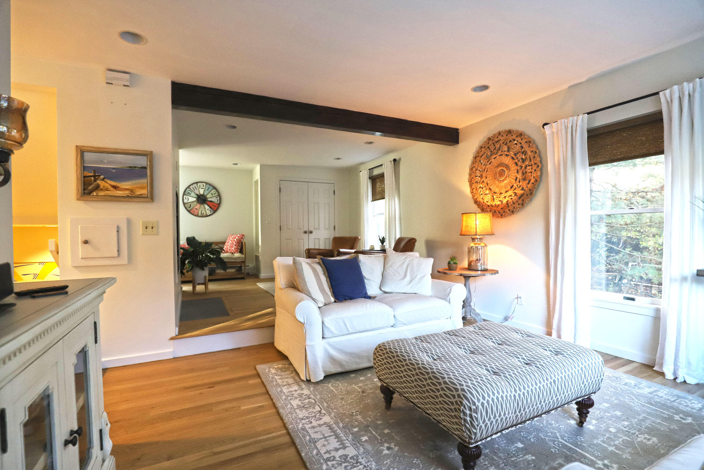50 Jackson Drive Cotuit, MA 02635 - Photo 18 of 30 a living room with furniture and a large window