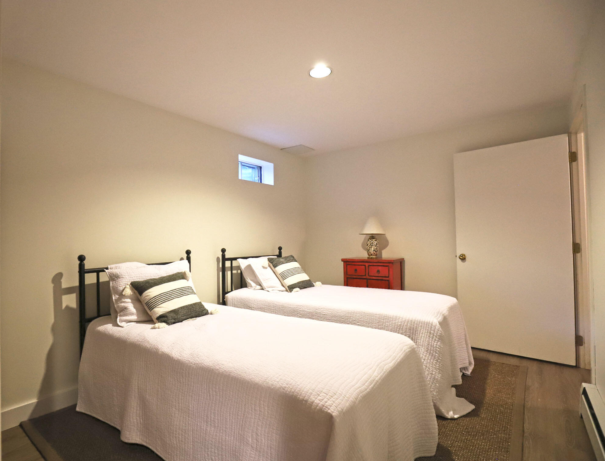 50 Jackson Drive Cotuit, MA 02635 - Photo 27 of 30 a bedroom with two beds and a lamp