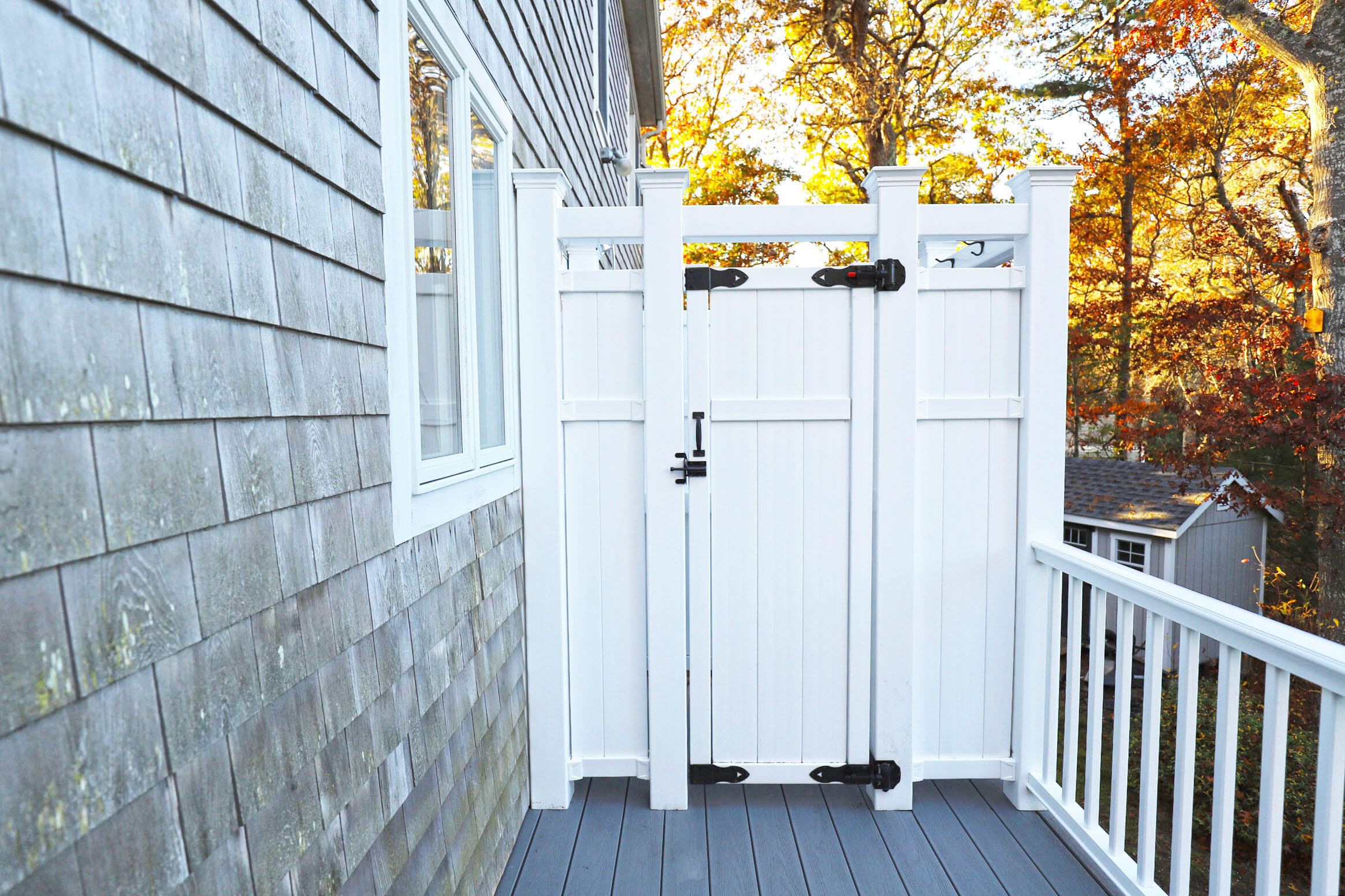 50 Jackson Drive Cotuit, MA 02635 - Photo 7 of 30 a view of a wooden door and a wooden fence
