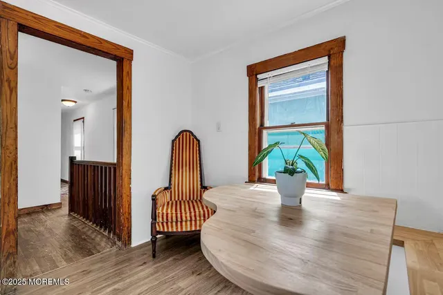a view of a bedroom with cabinets