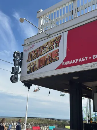 a group of people sitting outside of the building