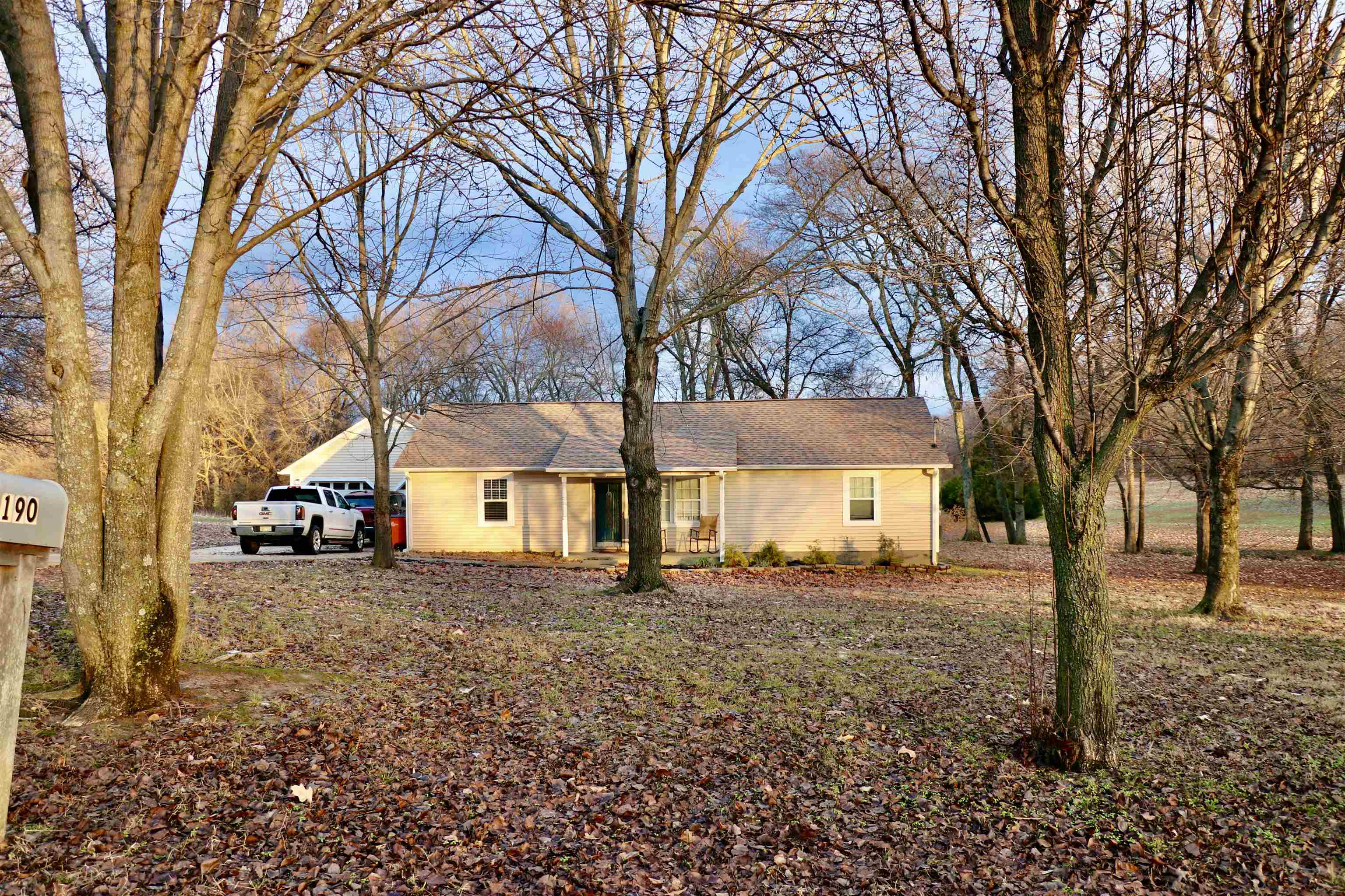 235 Tate Road Dyersburg, TN 38024 - Photo 1 of 28 a view of a house with a yard covered in snow