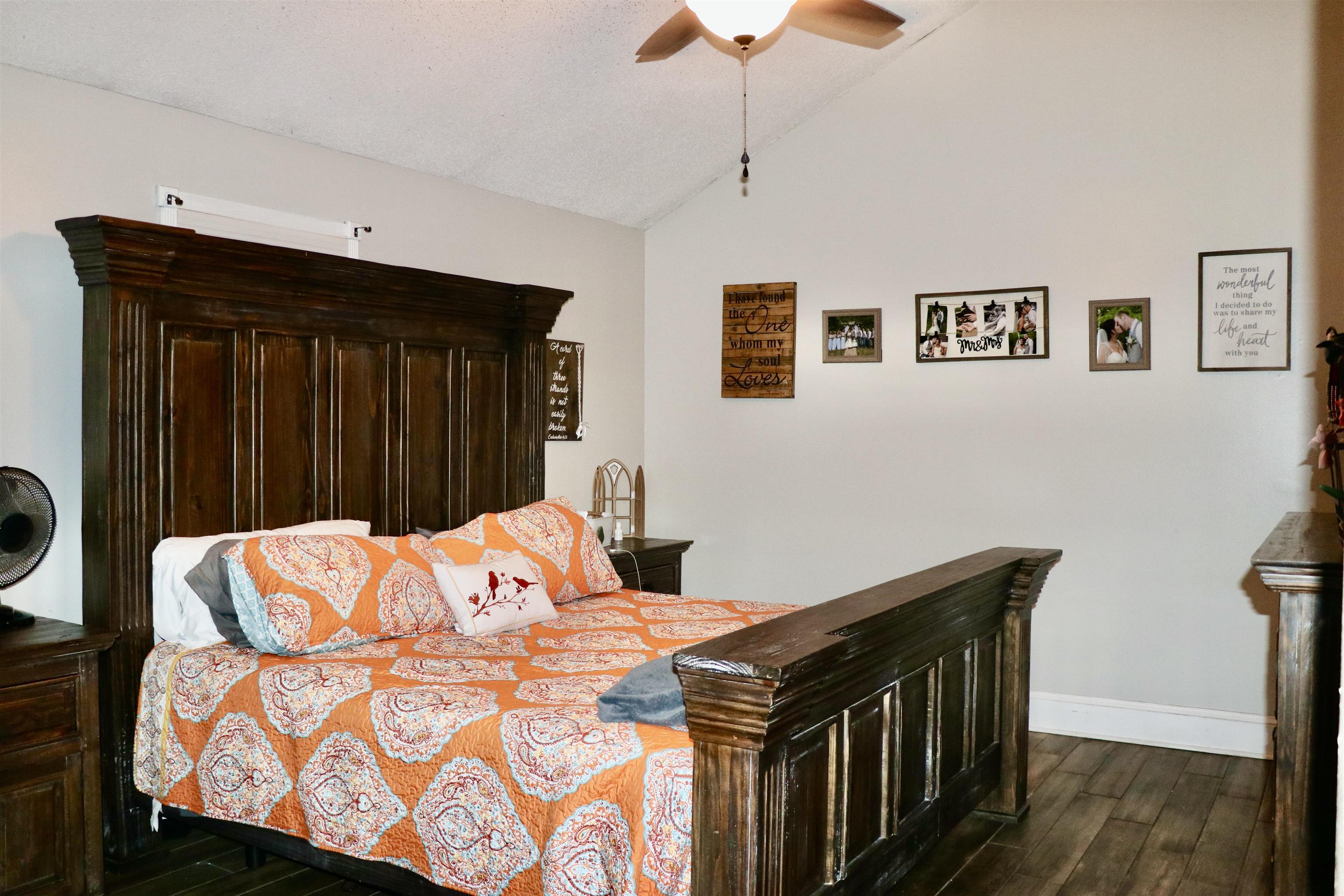 235 Tate Road Dyersburg, TN 38024 - Photo 13 of 28 a bedroom with a bed and a dresser
