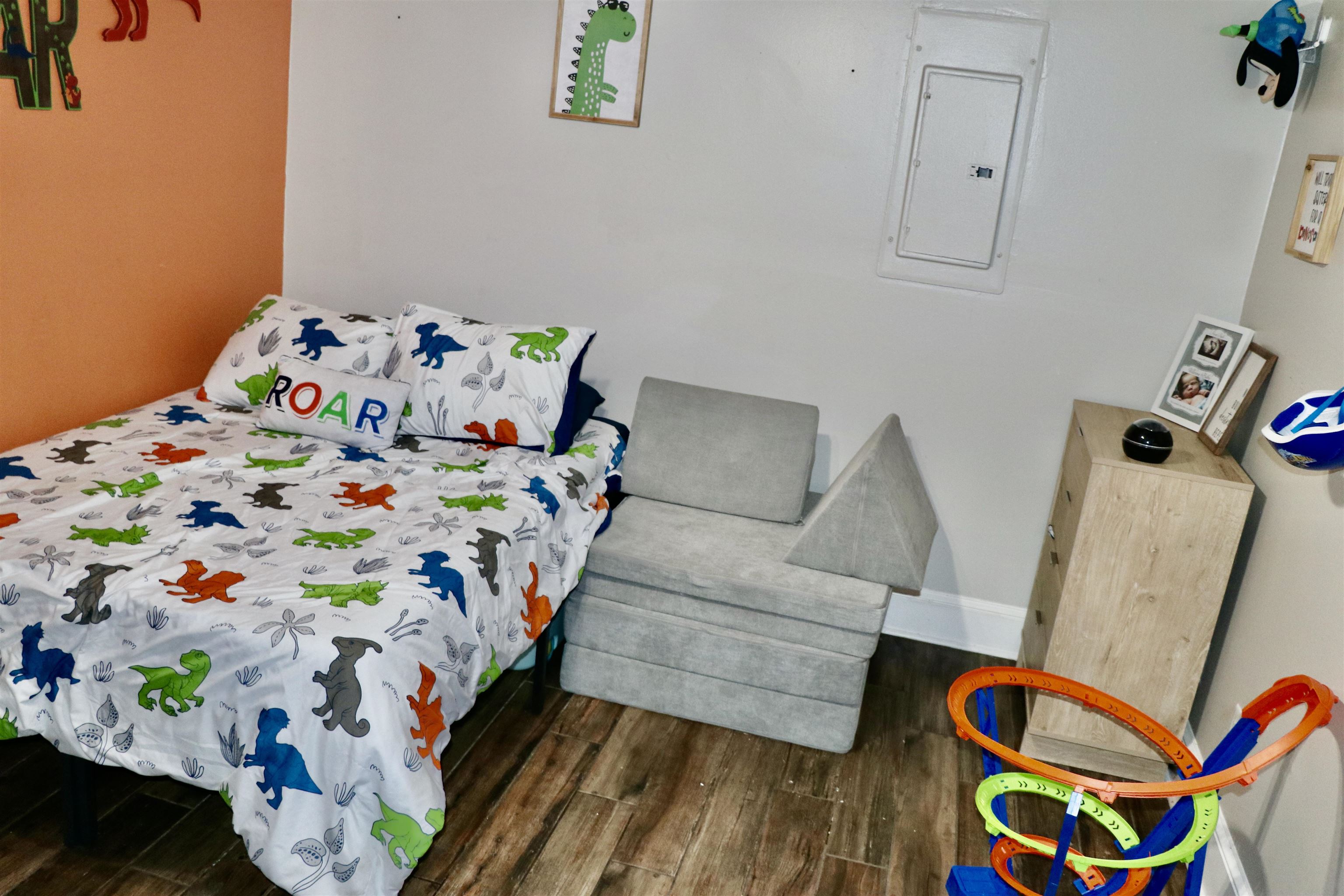 235 Tate Road Dyersburg, TN 38024 - Photo 18 of 28 a bedroom with baby bed and toys