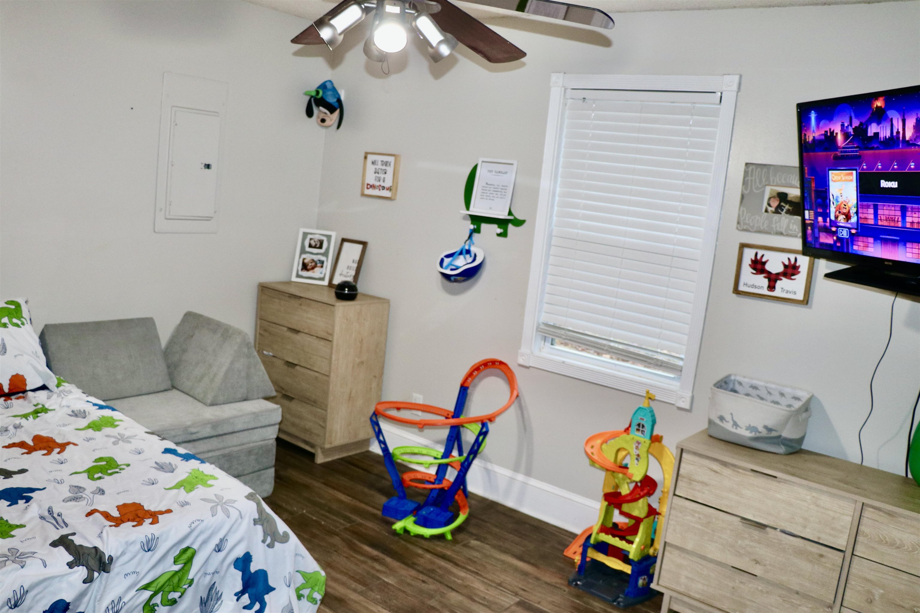 235 Tate Road Dyersburg, TN 38024 - Photo 19 of 28 a bedroom with furniture and a couch