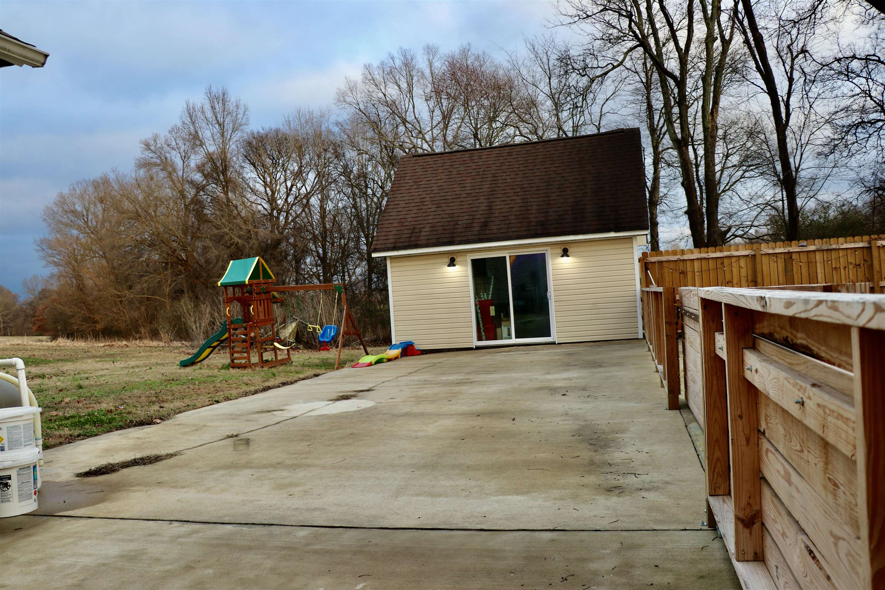 235 Tate Road Dyersburg, TN 38024 - Photo 24 of 28 front view of a house with a yard and a garage