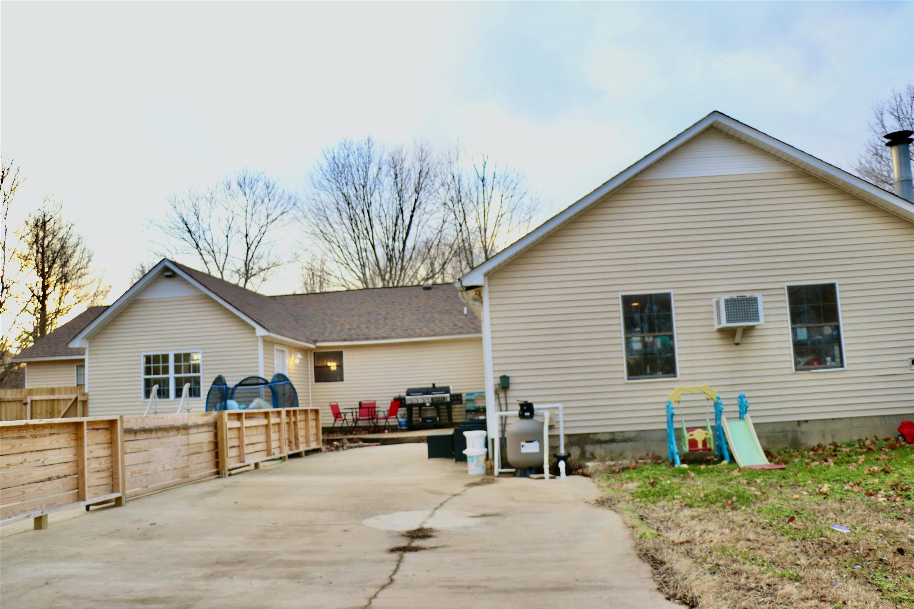 235 Tate Road Dyersburg, TN 38024 - Photo 25 of 28 a view of a house with a patio