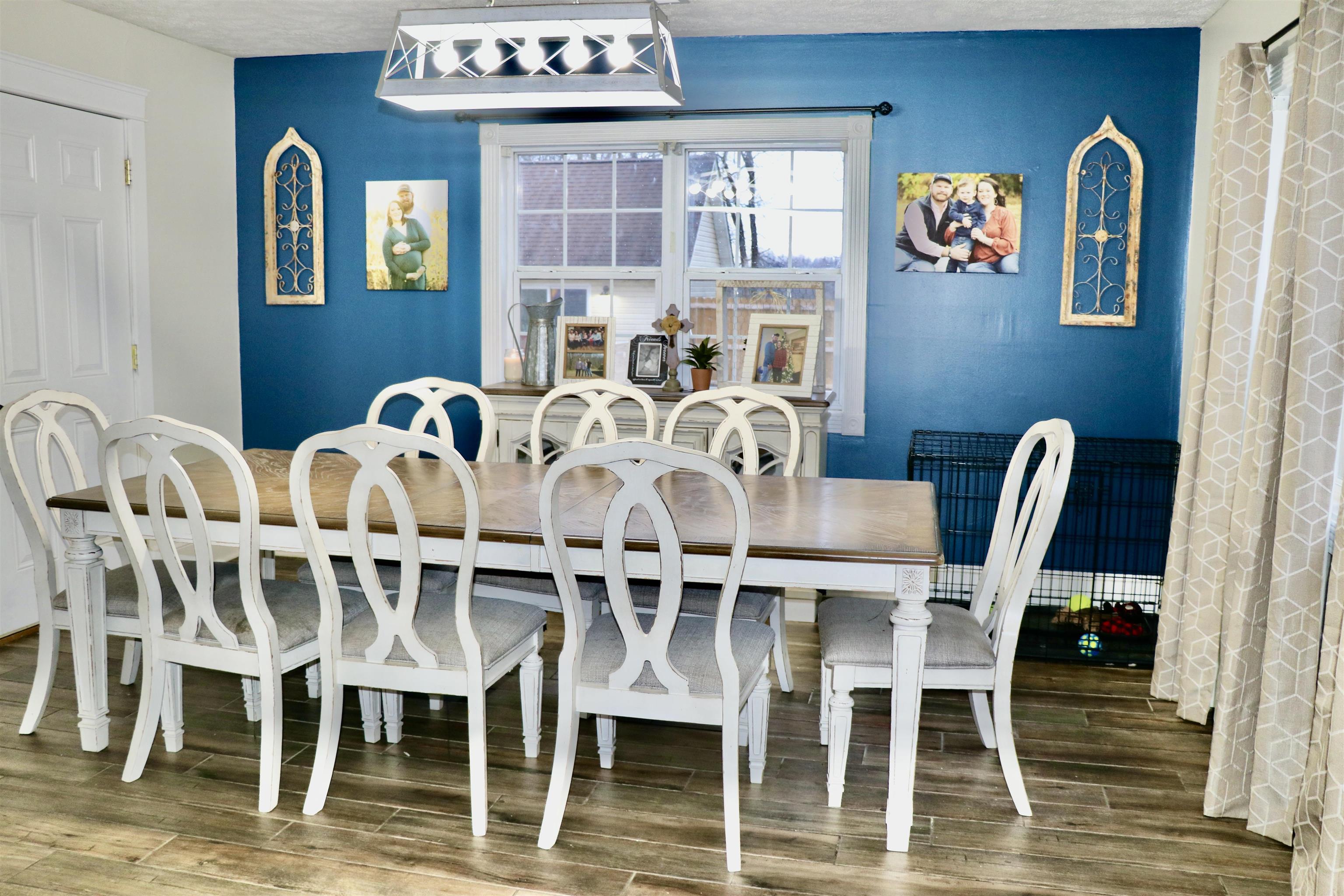 235 Tate Road Dyersburg, TN 38024 - Photo 8 of 28 a view of a dining room with furniture window and wooden floor