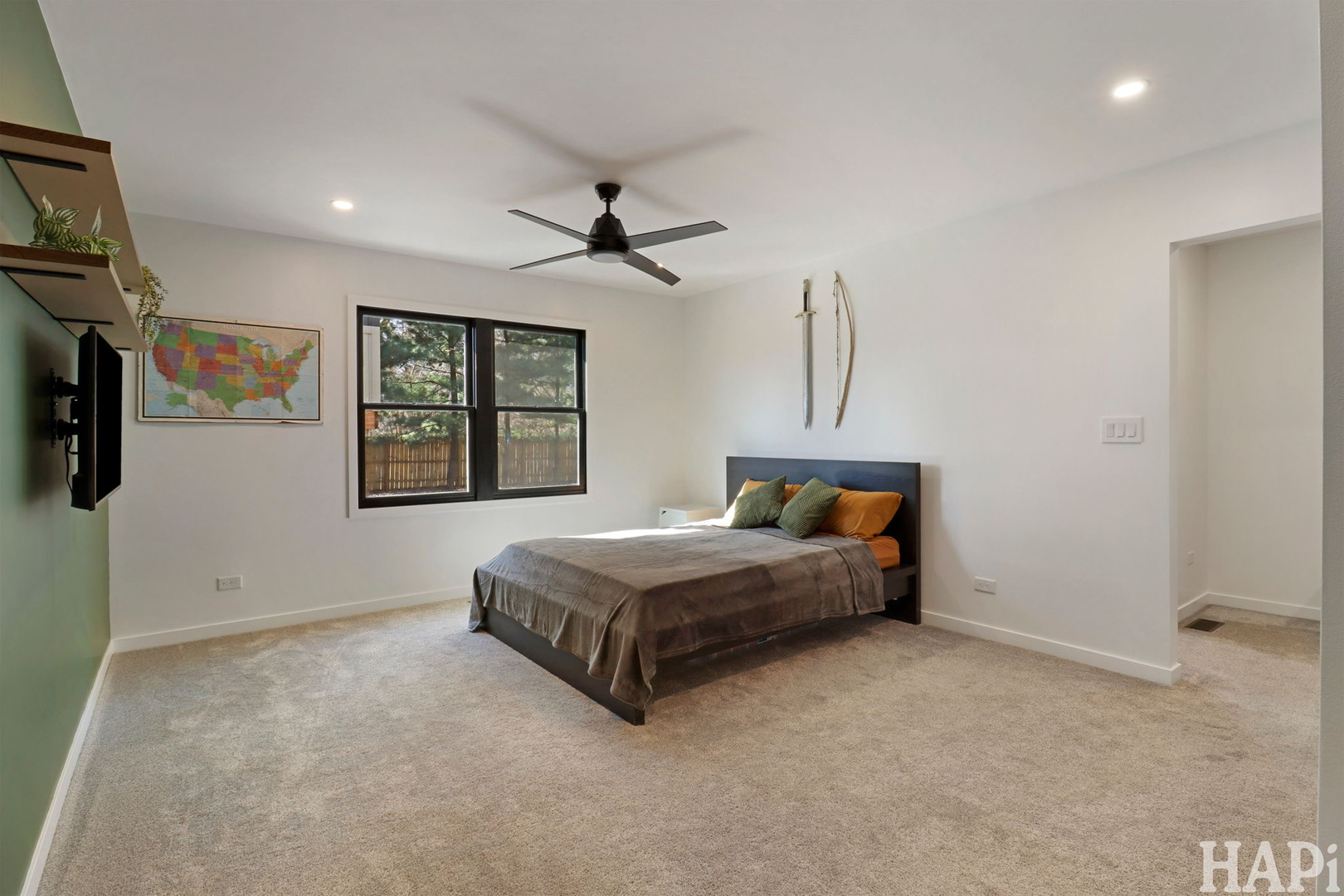 4321 West Lakewood Road McHenry, IL 60050 - Photo 17 of 51 a spacious bedroom with a bed and a window