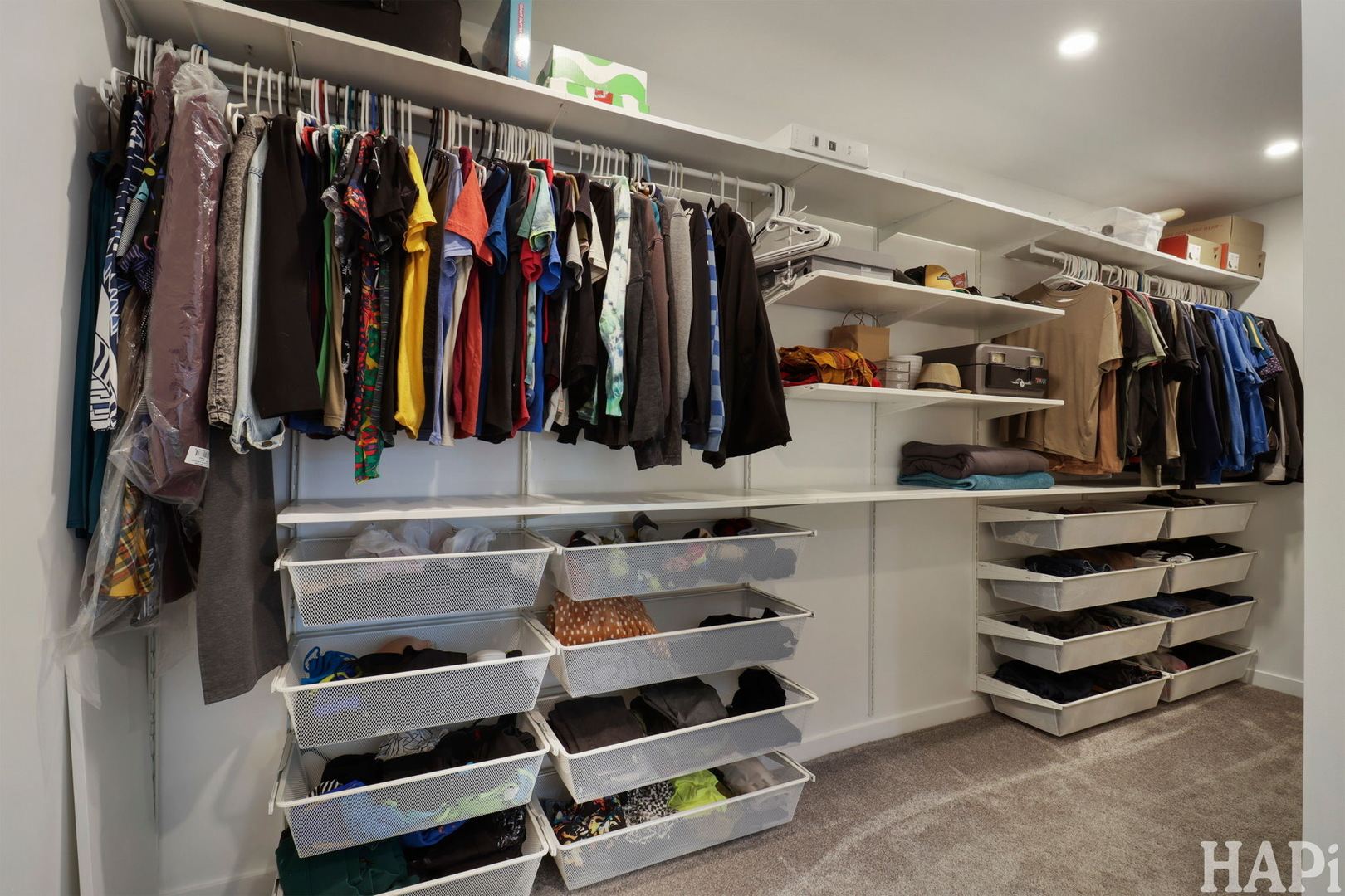 4321 West Lakewood Road McHenry, IL 60050 - Photo 19 of 51 a view of walk in closet with clothes and shoes