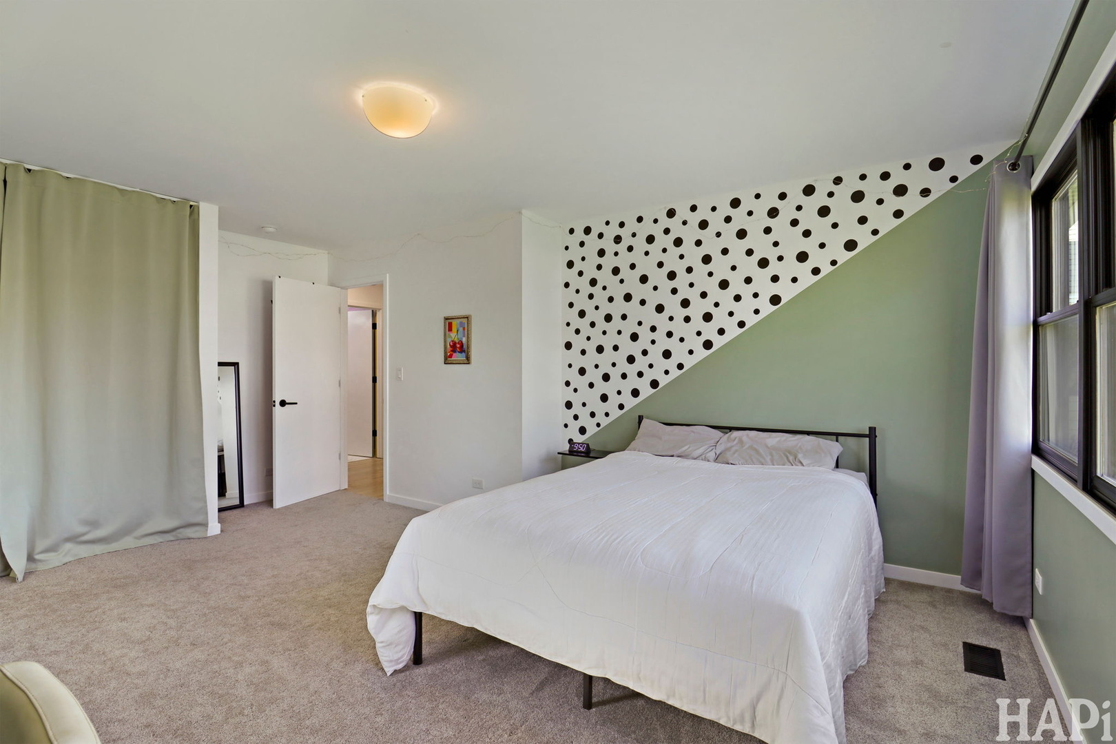 4321 West Lakewood Road McHenry, IL 60050 - Photo 24 of 51 a bedroom with a bed and wooden floor