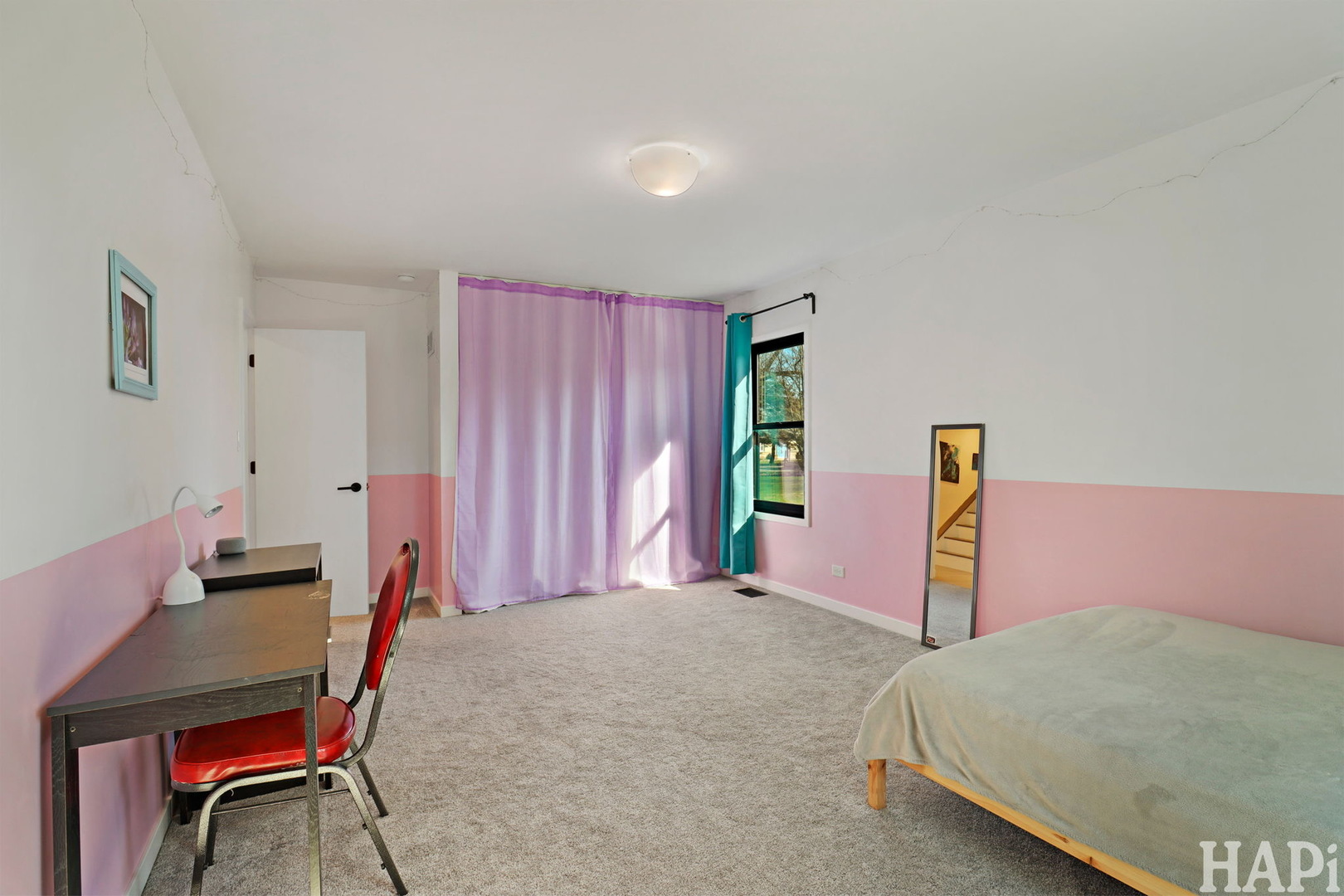 4321 West Lakewood Road McHenry, IL 60050 - Photo 25 of 51 a bedroom with a bed and a desk