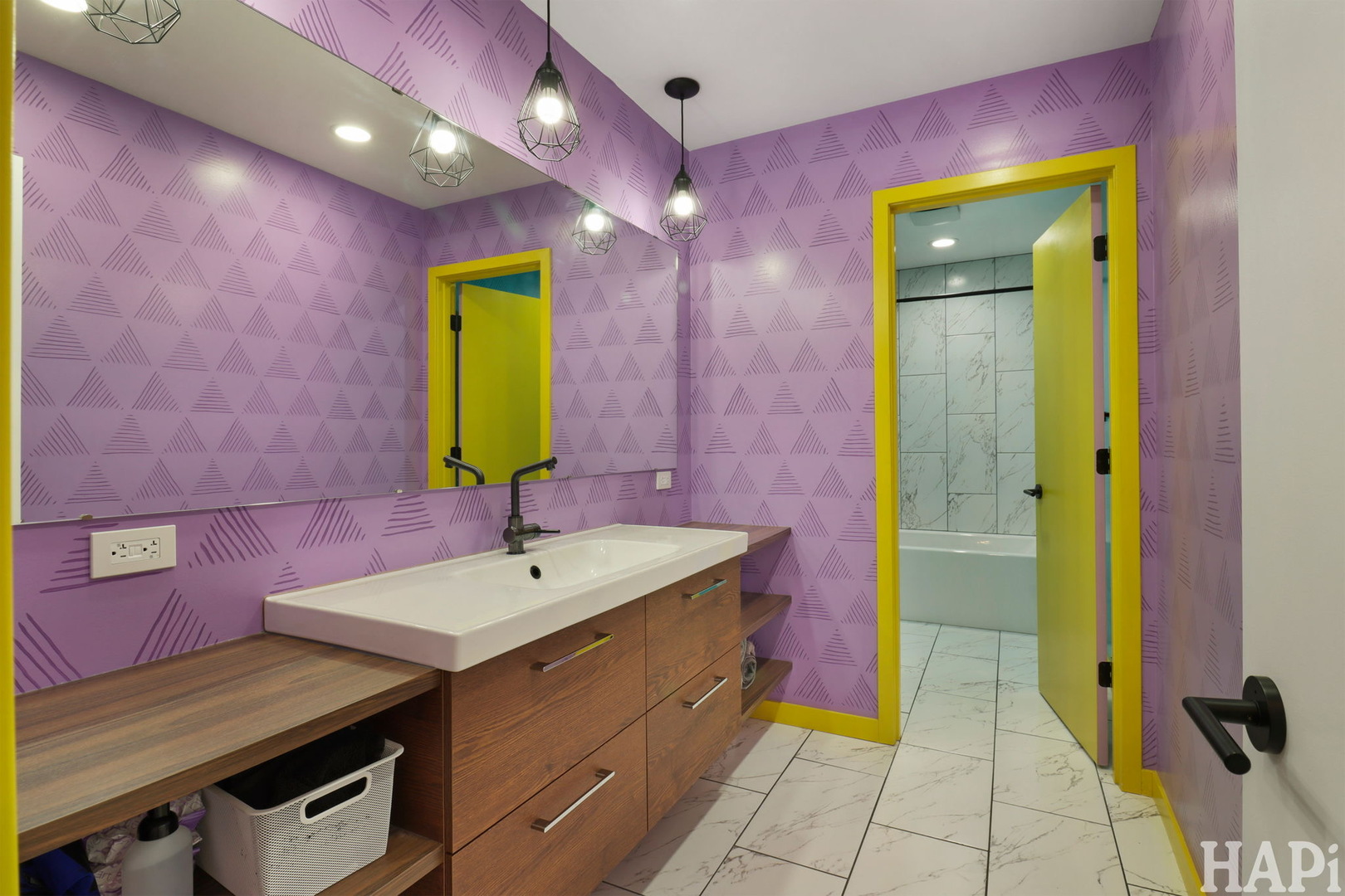 4321 West Lakewood Road McHenry, IL 60050 - Photo 30 of 51 a bathroom with a sink a mirror and a bathtub