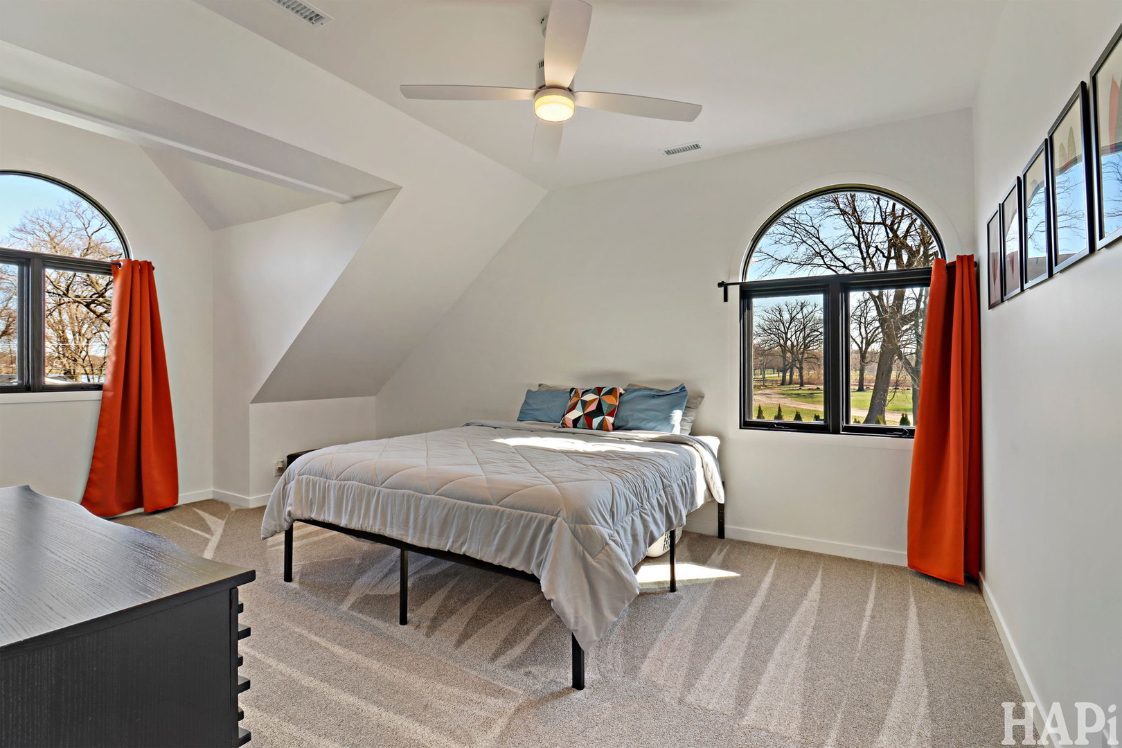 4321 West Lakewood Road McHenry, IL 60050 - Photo 36 of 51 a bedroom with a bed and a mirror