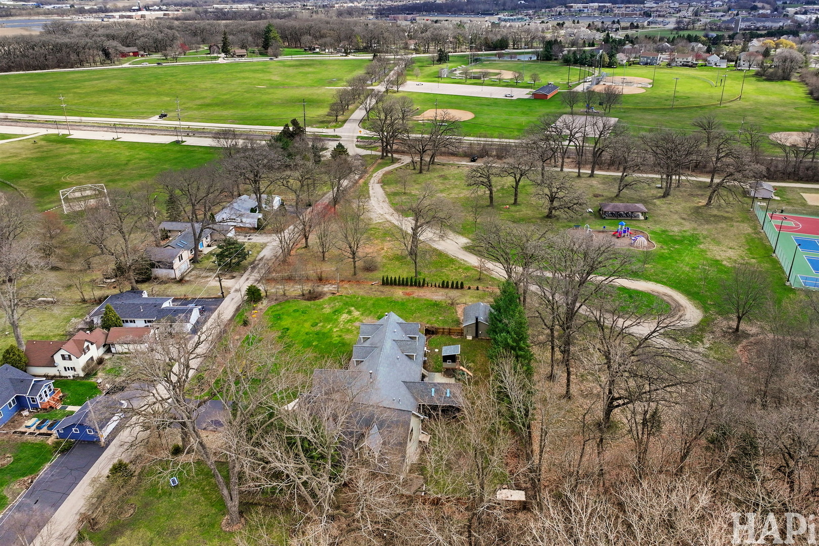 4321 West Lakewood Road McHenry, IL 60050 - Photo 45 of 51 an aerial view of a houses with outdoor space