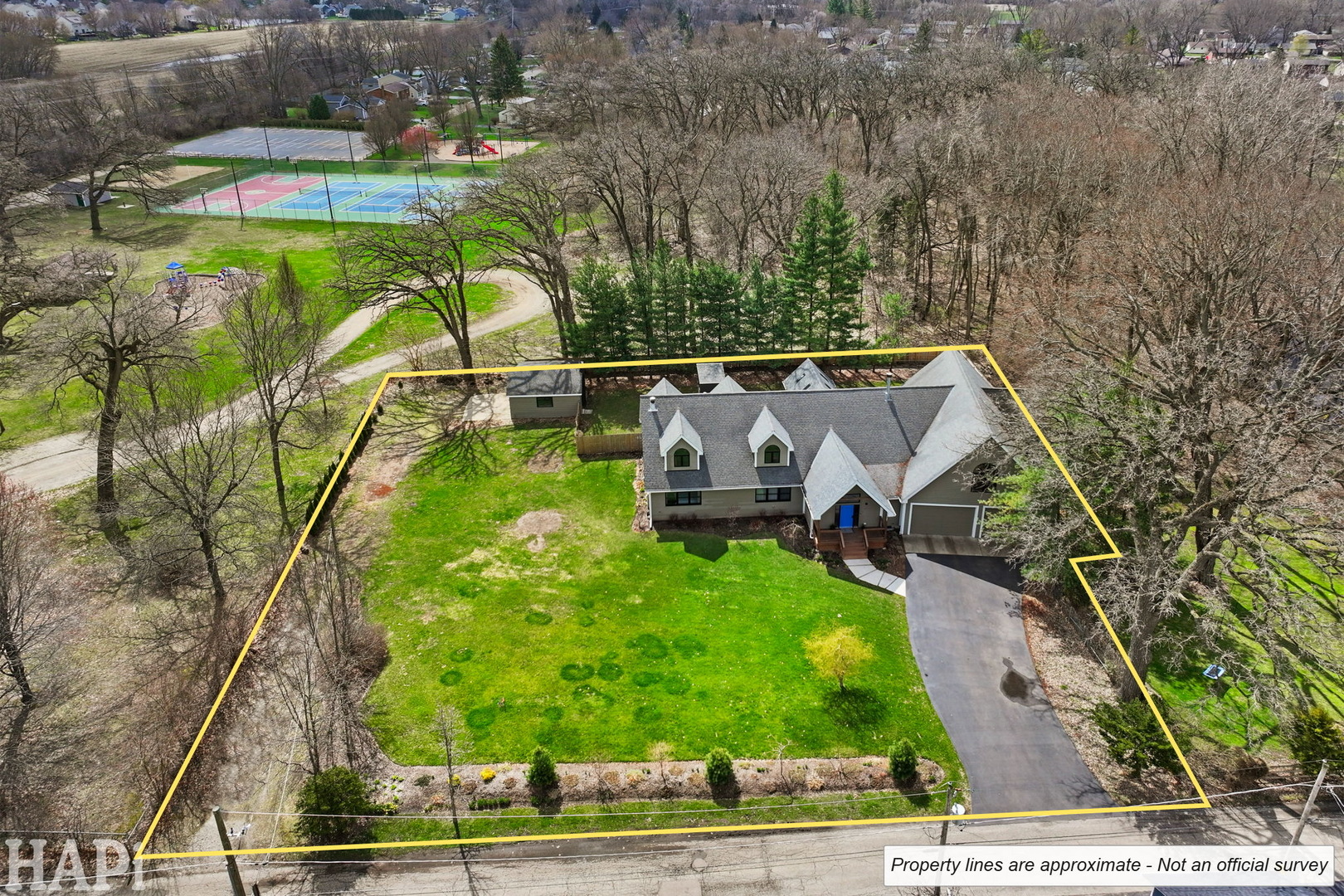 4321 West Lakewood Road McHenry, IL 60050 - Photo 46 of 51 an aerial view of a house with a yard basket ball court and outdoor seating