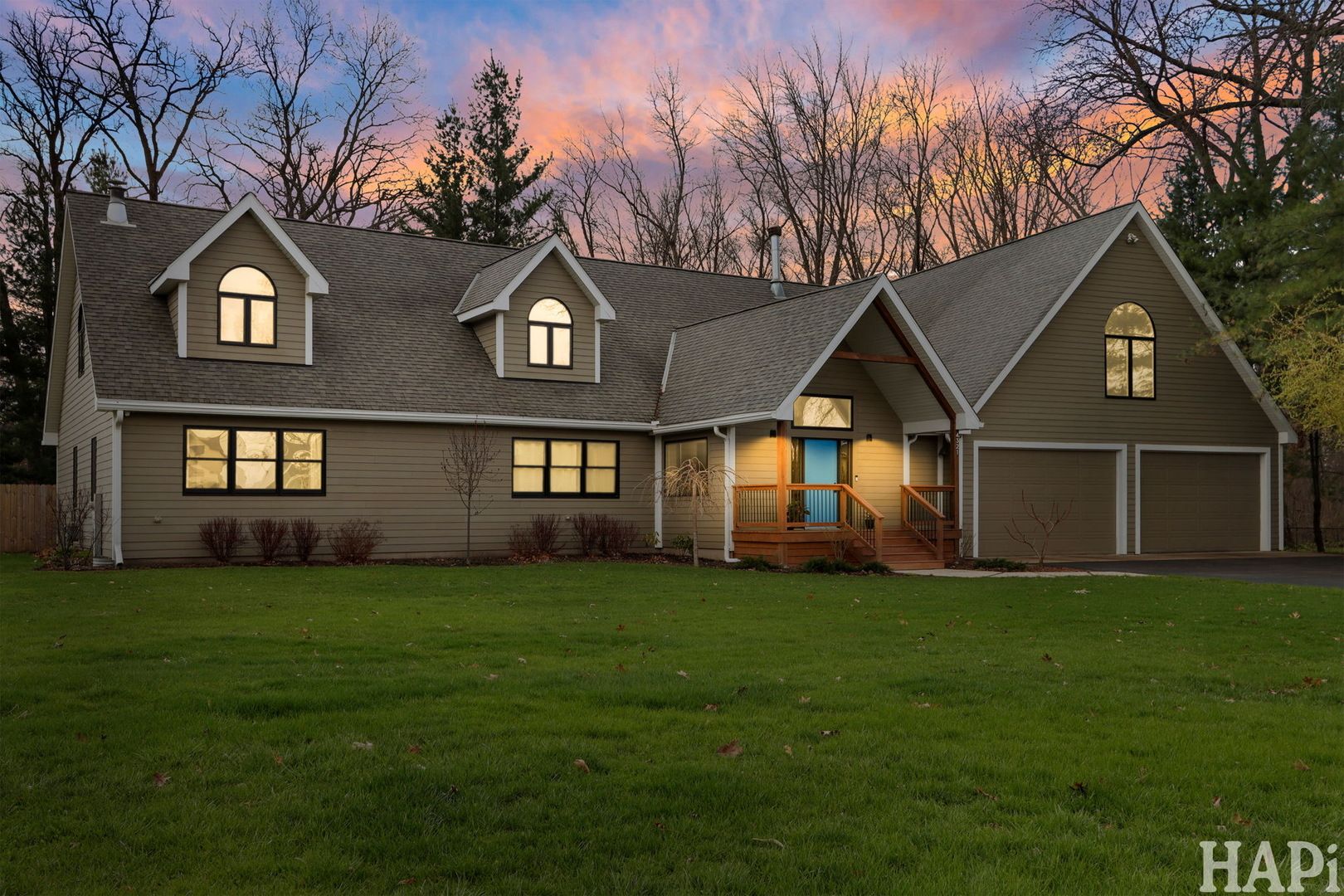 4321 West Lakewood Road McHenry, IL 60050 - Photo 49 of 51 a front view of a house with a yard