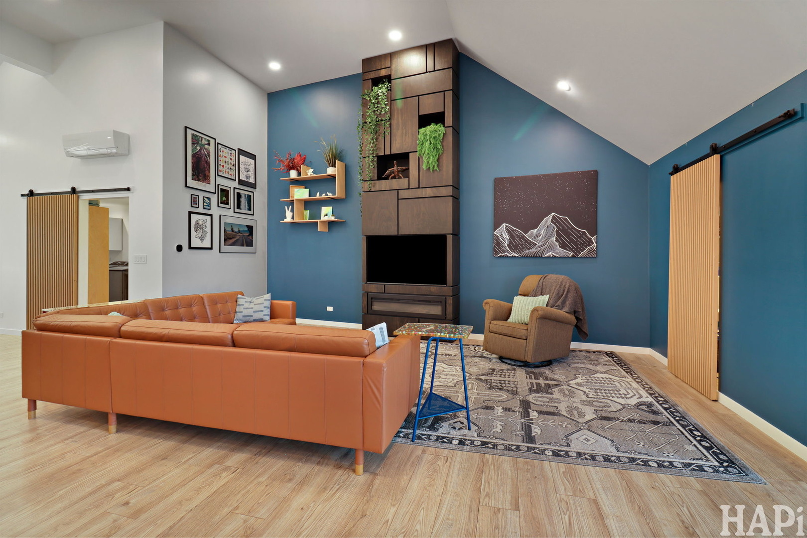 4321 West Lakewood Road McHenry, IL 60050 - Photo 5 of 51 a living room with furniture and a flat screen tv