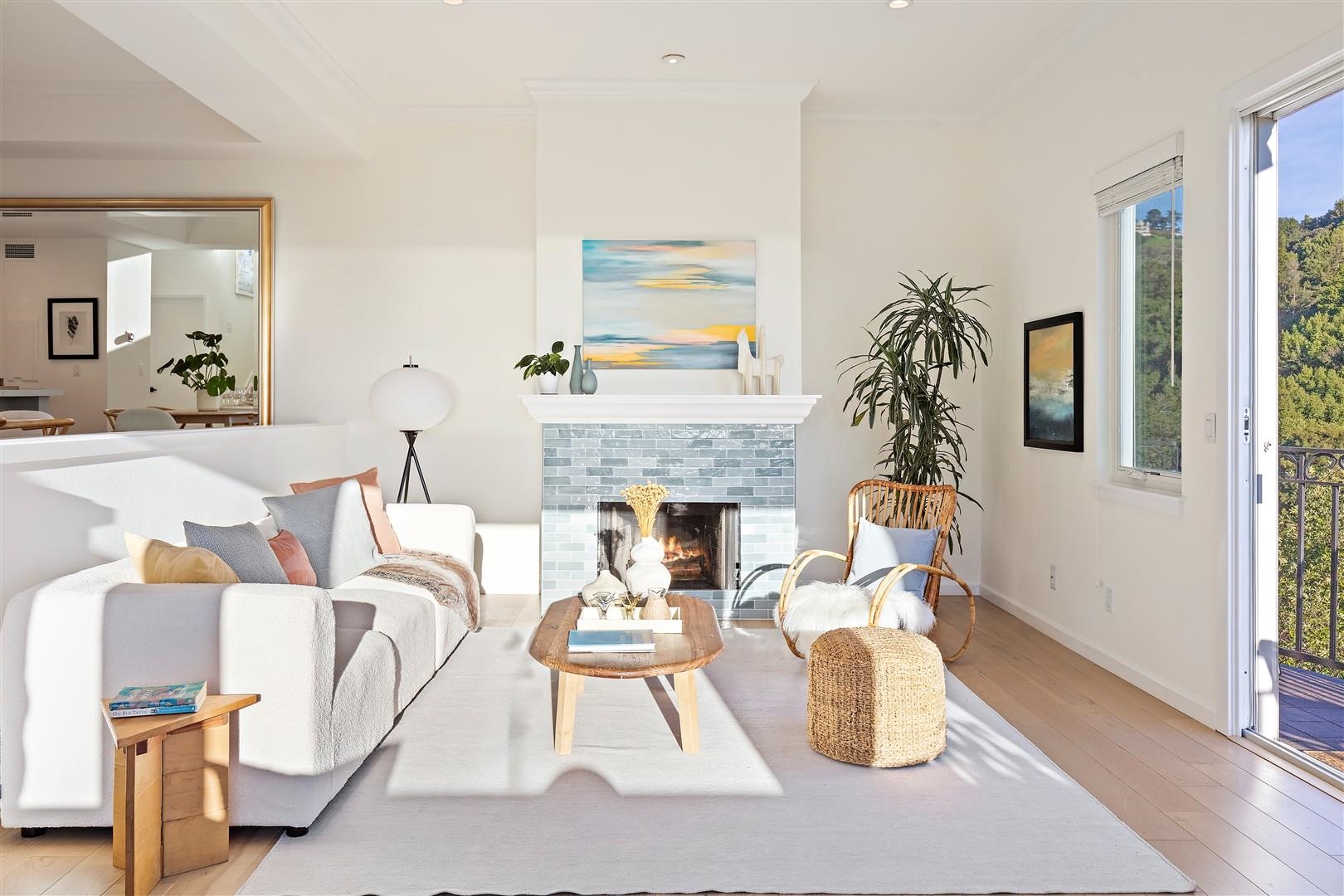 4630 Redwood Road Oakland, CA 94619 - Photo 12 of 58 a living room with furniture and a fireplace
